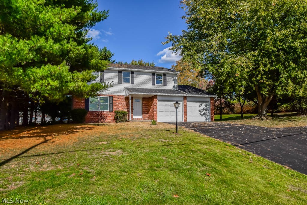 Beautifully remodeled 4 bedroom, 2.5 bath 2-story in Jackson! Tons of updates including bathrooms, kitchen, garage roof, doors and openers, windows, siding, all exterior doors, deck and more! Find your culinary inspiration in the breathtaking, remodeled kitchen with new white cabinets, soft close drawers, granite counters, subway tile backsplash, stainless steel appliances, a pantry and a large center island with seating! Dinette area perfect for a coffee station! Host holiday meals in the formal dining room then gather in the spacious front living room or in the back family room with sliding doors to the deck. New flooring and fresh paint throughout! Convenient half bath on the main level, too. Upstairs, the 21x12 master suite offers a 9x6 walk-in closet and a private full bath with a tiled walk-in shower and a shiplap wall. There are 3 additional bedrooms and a remodeled full bath with tile shower surround. Extra living space with a finished rec room on the lower level. Unfinished ar