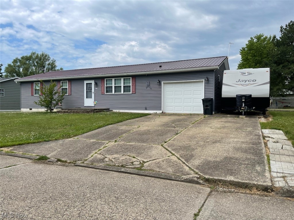 You don't want to miss this 3 bedroom MOVE-IN ready home!! Located minutes from town. You will love the nice flat fenced in yard, screened in back porch, two buildings for storage, and a newer metal roof. This home has many updates throughout and is ready for you to make it your own. Call to make an appointment.
