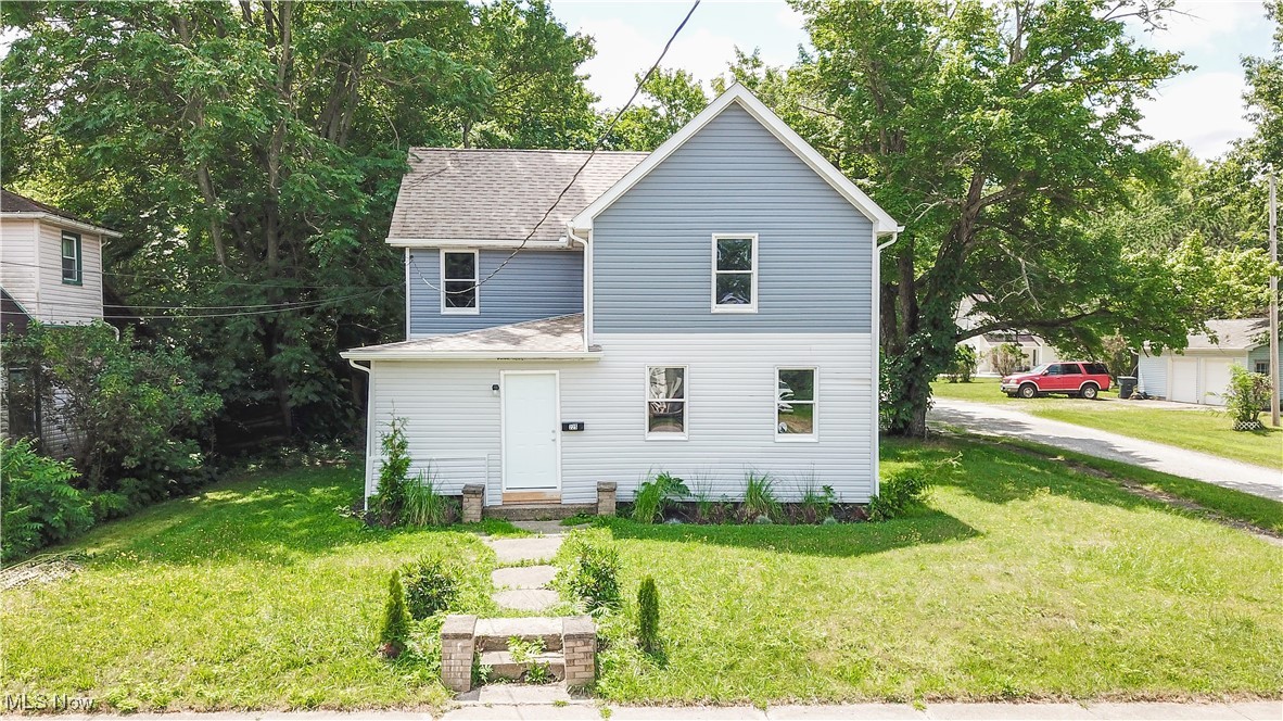 Welcome to this beautifully renovated 4-bedroom, 2-bathroom home where modern updates meet timeless colonial charm. Completely remodeled in 2025 every detail has been thoughtfully updated, from the brand-new roof, windows, and siding to the all-new furnace, A/C, electrical panel, outlets, and light fixtures. Inside, you'll find beautiful new flooring throughout and a completely renovated kitchen featuring sleek cabinetry, all-new appliances, and an open layout perfect for entertaining. The first floor boasts a spacious entryway that flows seamlessly into the open-concept living and kitchen area, along with a convenient first-floor bedroom and two full bathrooms, one of which includes first-floor laundry. Upstairs, you'll find three generously sized bedrooms and an oversized hallway landing that offers great potential as a loft, office, or reading nook. Step outside to enjoy a newly added gravel driveway, an attached carport, and a wooden patio perfect for relaxing or hosting guests. Located just minutes from downtown Wadsworth and close to shopping and amenities, this home combines modern comfort with timeless style in an ideal location. Don't miss your chance to make it yours!