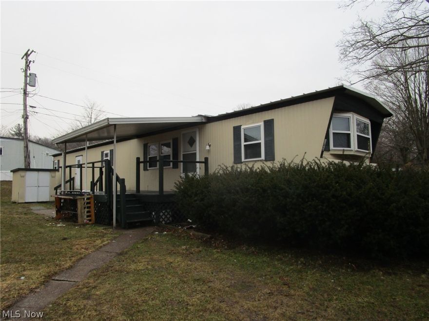 Call your Agent and come take a look! Clean and sunny kitchen, 13 x 9 shady, roofed deck, BIG living room and nice dining area - all on one floor ! 2 bedrooms (laundry area is on the back wall of the larger bedroom) and a full bath complete this modestly priced home in an established, well kept Park. The sellers have installed all newer floor coverings in recent years and are including the kitchen appliances. Taxes are unbelievably low, at 63.00 per year, and the 8 x 8 shed is included. Parkwood Village offers a clean, well kept park with a peaceful rural vibe. Wind through the curving streets, past the tranquil pond with its floating geese and enjoy the mature trees scattered throughout. This spot is just minutes from Route 11, Route 84, shopping, fine dining, Lake Erie, historic Bridge Street, medical facilities, parks, beaches, wineries and more. Management must approve all buyers in this established 35+ years park. Ask your Agent for the forms, rules, regs, etc that are provided in the supplements section. Current rent is 259.00 per month. See the supplements for charges for pets, and discounts for seniors, in the supplements section.There are a few pet restrictions. Residents pay their own water, sewer, heat, electric and trash. Residences must be owner occupied; no renting, leasing or sub-leasing is permitted.This is a 1970 Schult,  Title # 0400983098,  Serial # M95027. No cash? Need a loan!? The Listing Agent can provide contact info for a few potential mobile home lenders - have your Agent reach out!.