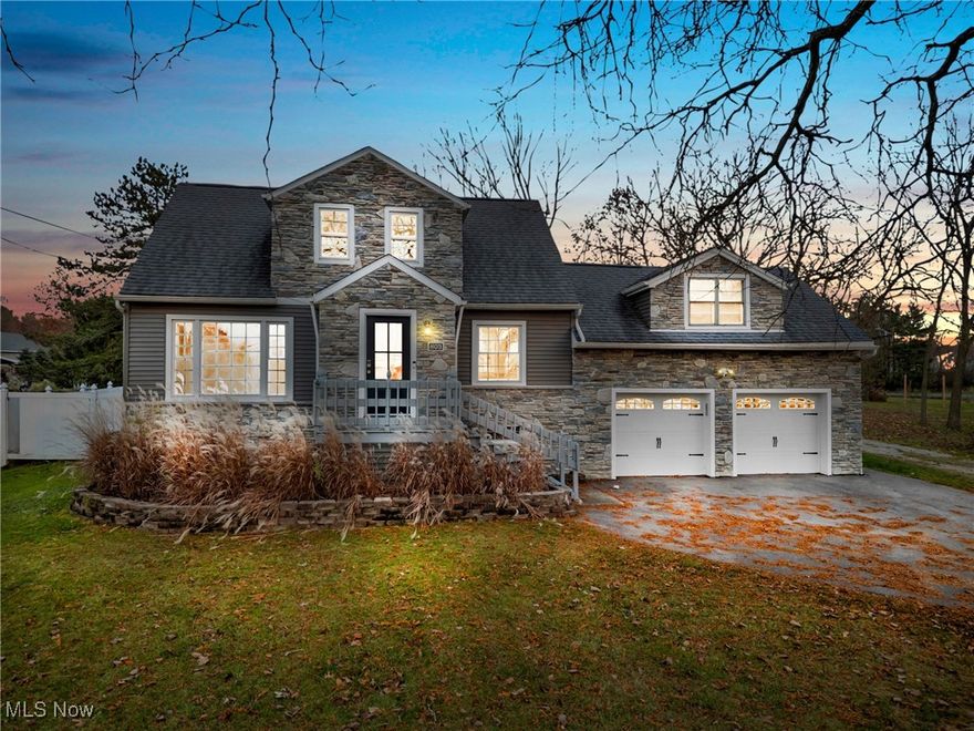 Put your thinking cap on and bring this home into 2026 with a few easy projects! The possibilities are endless with this unique property located in Brunswick Hills! Situated on 3.8 acres you will find a charming home, enclosed porch, large back deck with a hot tub (included in the sale), brand new large outbuilding with car lift for a dream shop! It has a small orchard, and another small outbuilding. Want to start a small hobby farm? Want a large space for all your toys? Do you need a large workshop? You have so many options here! Inside you will find an updated kitchen, dinning room with lovely built-ins, cozy living room with a wood burner, a full bath, and a first-floor master. All with beautiful new flooring! There are 3 additional bedrooms and a half bath located upstairs. The basement has a living area with another wood burner, a small kitchen area, and the laundry room. Above the two-car garage, is an additional bedroom and half bath it needs remodeled but you can create instant equity and turn it into a in-law suite, a office, or even rent it out, whatever you can dream! No city taxes in Brunswick Hills! Come check out everything this home has to offer!