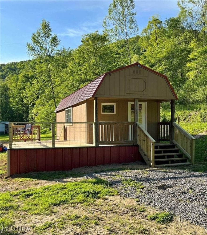 Newly renovated riverside tiny home on nearly 0.75 +/- acres. High potential as an income-producing Airbnb or enjoy it yourself as a relaxing hunting camp on the river, nearby to thousands of acres of DNR public hunting land. Situated by the Kanawha River on a quiet country road..enjoy kayaking, fishing, boating, whitewater rafting, and riding backroads right from your doorstep. Just 1.5 miles from Falls Mill, 4 miles to Burnsville Lake, and 12 miles from Flatwoods and I-79. Within close proximity to New River Gorge National Park with world-class outdoor activities. Don't let this opportunity pass you by, call or text the listing agent today to schedule a showing!