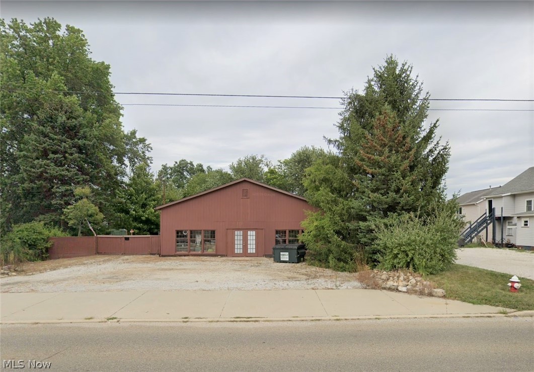 For Lease -- 3,200 sf mixed use building: retail or office, warehouse and offices or apartment. Potential live and/or work situation. Zoned C-2 "General Commercial Development". It is located in the North Canton City School District and is located in Lake Township. Front retail or office space has a half bathroom. Warehouse space has two 10' x 12' overhead doors with garage door openers, 11' ceiling and floor drains. Apartment or office space has one bedroom with walk-in closet, kitchen, living room and dining areas, laundry area, full bathroom, central air and gas furnace. This space can be accessed from the outside on the side of the building or it can be accessed off the warehouse area. Lighting and plumbing will be updated. Fenced in back area.