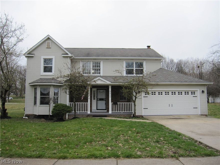 Beautiful 4 bedroom colonial next to a beautifully maintained city park and a spacious backyard.  This home features a two-car-attached garage with electric opener.  Garage opens to a laundry/mud room that leads to an open-concept main floor and a Family room with woodburning fireplace, renovated kitchen with quartz countertops, new appliances and cabinets, convenient updated half bath, dining room and living room all with LVP Flooring throughout the first floor plus second floor bathrooms and hallway.  New soft-close cabinets and lighting throughout. The open foyer staircase leads to the three spacious bedrooms with new carpet and a full bathroom.  The main suite features a spacious bedroom, walk-in closet, and well appointed new bathroom with walk-in shower and double sink vanity.  New paint and flooring throughout.  Finished basement has a Rec Room includes and a separate office space.  New High-Efficiency Water Tank and HVAC.  This special house is ready for the new owners to move in and enjoy!  Located near downtown, Shaker Lakes and University Circle, this one won't last.