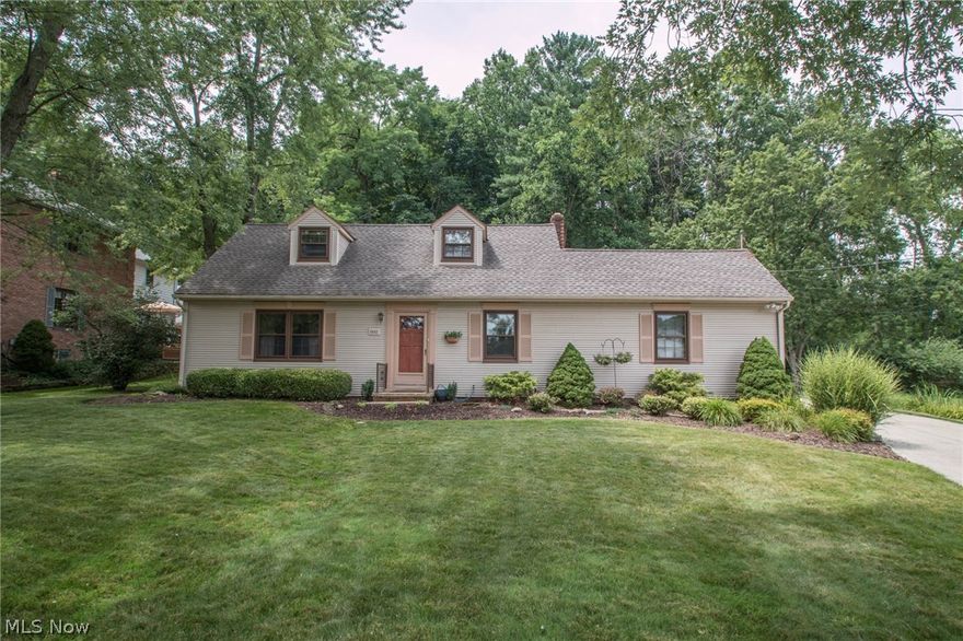 Welcome to this charming cape cod nestled on a wooded lot located on a quiet street in the wonderful community of Independence. The house has a remodeled kitchen with plenty of cabinets for storage and lots of counter space. There's a 4 season room located off the kitchen that is ideal for a family room, which leads to a custom patio with a pergola. The sun filled living room has beautiful hardwood floors and built-in shelves. There's a first floor bedroom which can be used as a master bedroom located next to a full bathroom. Upstairs there are 2 bedrooms with a remodeled full bathroom. The attached 2 car garage is heated and can be used for storage. The oversized 3 car detached garage is perfect for a car enthusiast or wood shop, with plenty of room for storage in the upstairs. Recent updates include, newer roof, boiler and AC. The house was recently painted. Easy access to I-480 and 77.