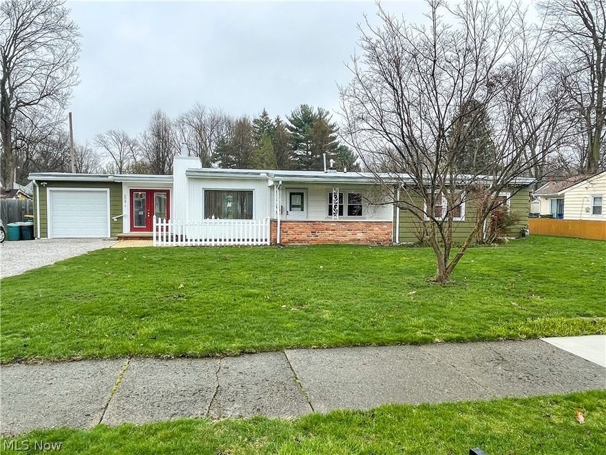 Well maintained ranch in the heart of Mentor. This home has a Mid-century flair throughout, and is so unique. The floor plan is great, and lends itself well to entertaining. The living room has a large gas fireplace and is open to the dining area. The kitchen has loads of custom wood cabinets with plenty of storage solutions and even a breakfast nook. Great midcentury style sink and all appliances complete the nice sized kithcen. The bath/ laundry room is off the kitchen, and leads to great sized backyard. The breezeway has been enclosed and has a heater for year-round use, with great access and views of the backyard. Off the breezeway is a large one car attached garage. Three nice sized bedrooms, with impressively sized closets with great shelving with extra built ins. Come see all that this home has to offer! You will be pleasantly surprised with all the storage throughout with lots of cabinets and large cabinets.  This home has been well maintained and updated through the years. Por