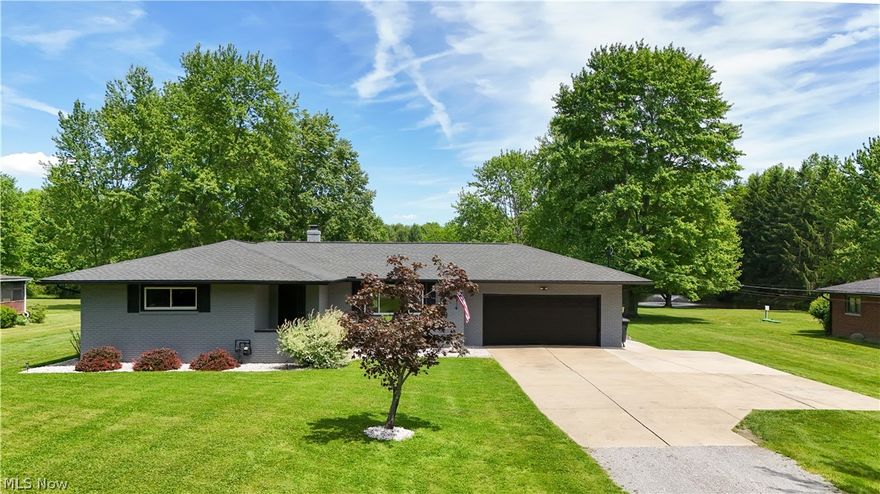Take a look at this beautifully remodeled home! The first floor has an open concept with the kitchen, dining, and living room. Hardwood flooring throughout. The spacious kitchen has black wooden cabinetry, a stone backsplash, stainless steel appliances, and an eat-in dining area big enough for the whole family. The full bathroom on the main floor is also very spacious, has tile flooring and a chocolate vanity. The 3 bedrooms all have hardwood flooring throughout and are on the same level giving comfort to any young family. The basement is finished with hardwood flooring, an extra living room, a gaming area, and even a play area for any children. There's also a full bathroom in the basement with tile flooring and a white vanity. The covered back porch is immaculate with both a deck and patio for outdoor seating. The backyard has a built-in fire pit, a spot for a play place for children, and a small private pond. There's a chicken shed and a nice tool shed on the property. The attached garage is spacious enough to keep your vehicle out of the weather elements, and has enough space for tools and equipment as well. The septic is new in 2023 and the roof is new in 2022. Come and make this your new home today!