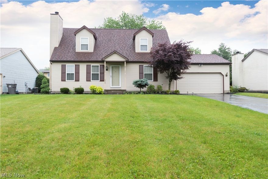 Completely updated, move in ready 3 bedroom Cape Cod home in Austintown near the Mill Creek hike and bike trail. The Home has hardwood floors and fresh neutral paint throughout. The front door leads into a spacious living room with gas fireplace, formal dining room, eat in kitchen with stainless steel appliances that stay with the home. 1st floor bedroom and full bath. The 2nd floor has 2 large bedrooms with walk in closets and another full bath. Full basement has a finished family room and unfinished utility and laundry area. The exterior spaces include a 2 car attached garage, large covered back porch and shed and landscaped back yard. Updated include high efficiency furnace in 2006, new hot water tank in 2016 and new central air in 2017. Home warranty included. Call today!