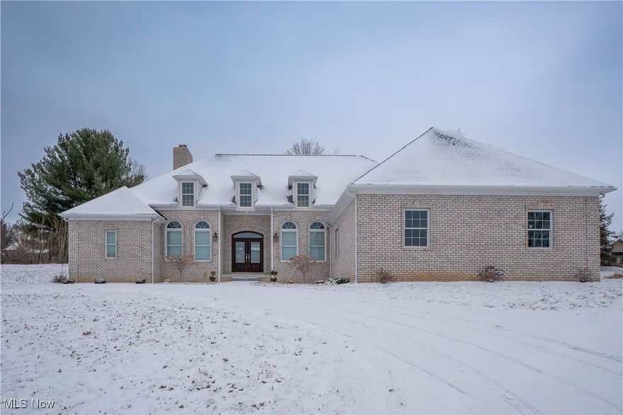 Custom-built all-brick ranch situated on a private 1.41-acre tree-lined lot in a prime Jackson Township location. Set well back from the road, this home offers a circular driveway and a peaceful backyard setting.
Built in 2019, this thoughtfully designed 3-bedroom, 2.5-bath home offers over 2,650 sq ft of one-level living with 12-foot ceilings, wide hallways, and wheelchair-accessible entry, creating both elegance and ease of living. The welcoming foyer opens to a spacious great room featuring a wood-burning fireplace with gas starter, big windows providing abundant natural light.
The open-concept kitchen is a showstopper, complete with high-end cabinetry with soft-close and full-extension drawers, granite countertops, tile backsplash and a large center island with cooktop and range hood. Top of the line stainless steel appliances. A breakfast bar flows seamlessly into the expansive dinette area, perfect for entertaining.
The primary suite is generously sized with tray ceilings, a large walk-in closet with pocket doors, and a spa-like bath featuring a double vanity, jetted soaking tub, and an upgraded tiled walk-in shower with rain shower heads.
Bedrooms two and three offer ample closet space and share a Jack-and-Jill full bath.
Additional main-level features include a formal dining room, first-floor office, convenient main-floor laundry with utility sink and cabinetry, updated powder room, even a central vacuum in the basement. The heated 4-car oversized garage offers deep bays, large doors, and hot/cold water hookups—ideal for hobbyists or extra storage.
The full 13-course basement provides endless potential, already plumbed for an additional full bath. A whole-house Generac generator adds peace of mind.
A rare opportunity to own a meticulously maintained, high-quality ranch on acreage in Jackson Township—this home truly has it all. Call now!