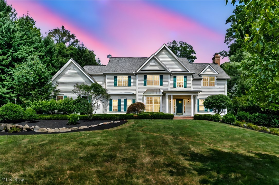 Welcome to this beautifully maintained two-story home nestled on a serene 1.3-acre lot in the highly sought-after South Russell/Chagrin Falls area. Built in 1995, this spacious residence offers over 5000 square feet of living space with 4 generously sized bedrooms and 6 bathrooms, thoughtfully designed to accommodate both family life and entertaining. The main level features a sun-drenched open concept two story great room with a fireplace overlooked by the well-appointed kitchen. There is a formal dining room and large den with built ins and a second fireplace. The upstairs has 4 large bedrooms plus a loft. The master suite has a sitting area overlooking the backyard with a large deck that overlooks the stream in the peaceful wooded backyard. Additional highlights include a three-car attached garage, walk-out basement, tons of storage, mature landscaping, and a layout that offers privacy and comfort in equal measure. With classic architectural charm, modern updates, and a prime location close to top-rated schools, shopping, and dining, this home presents an exceptional opportunity in one of Northeast Ohio’s most desirable communities.