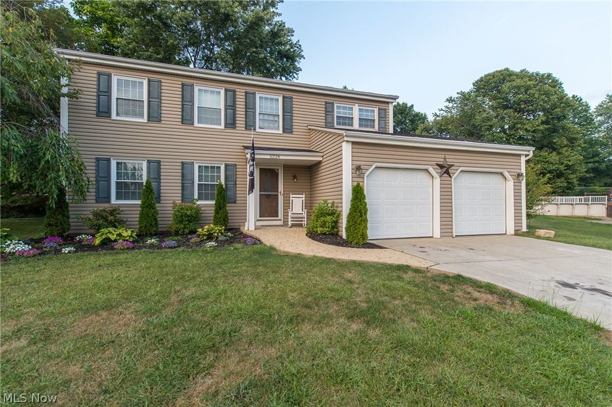 Lots of updating done here!!! Newer roof, windows, hot water tank, fresh new landscaping, newer vinyl siding, concrete drive and stamped walk way!!! The main bath has also been completely renovated! Fantastic rec room with additional place for storage!  Fully appliance kitchen also including the washer and dryer!!!  On a perfect quiet cul de sac with a magnificent yard with large deck off of family room.  Fantastic home with loads of curb appeal!