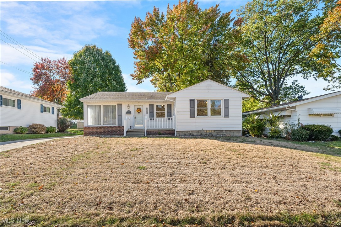 Welcome to 2220 Wedgewood Dr., a charming 3-bedroom, 2-bath ranch nestled in the heart of Ellet. Step inside to an open, light-filled living and dining area featuring fresh paint and neutral carpeting. The fully applianced kitchen with vinyl flooring sits conveniently off the dining room. An enclosed 25' x 9' back porch adds approximately 225 sq. ft. of extra living space—perfect for entertaining or relaxing on warm evenings. The main level includes three comfortable bedrooms and a full bath. Downstairs, the partially finished basement offers a 30' x 12' recreation room, a full bath, and three additional partially finished rooms, providing plenty of flexibility for storage, hobbies, or a home office. This well-cared-for home is being sold AS IS and is ideally located near shopping, the local library, fitness centers, and metro parks. Conveniently just 6 miles from the University of Akron, 16 miles from the Akron-Canton Airport, and less than a mile from I-76.