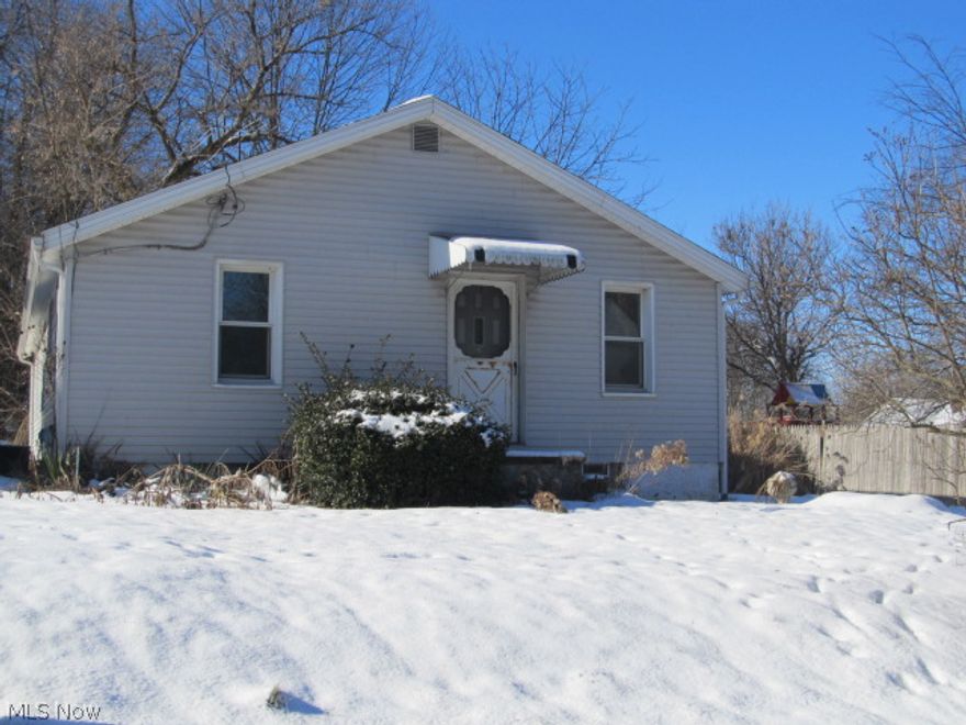 Great Investment! 3 bedroom Ranch in Massillon. Vinyl Siding. Large double lot with fenced area -  .344 acres! One block from Paul Brown Tiger Stadium. Needs TLC. Property Sold "AS-IS."