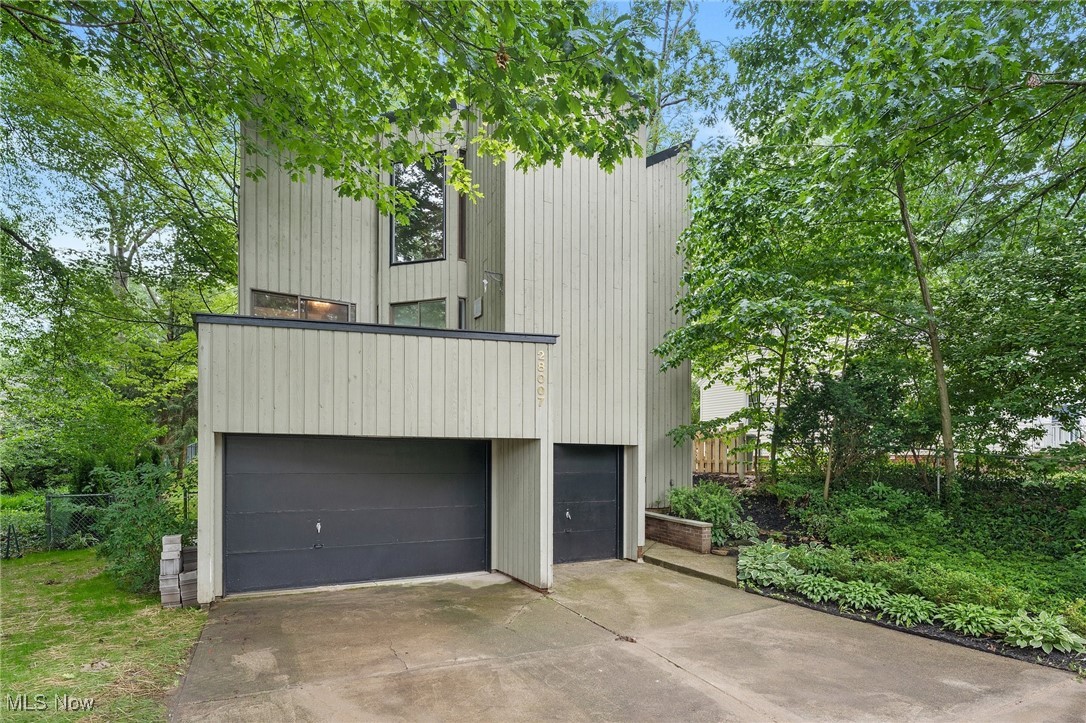 THIS could be THE PLACE! This extraordinary residence, originally designed by acclaimed contemporary architect William Trout, has been thoughtfully and beautifully renovated—offering the best of bold architectural vision and modern-day comfort.
Set on a private, tree-lined lot, the home is flooded with natural light thanks to expansive walls of windows and oversized doors throughout, seamlessly connecting interior spaces with the surrounding landscape. Step outside to discover three private balconies and a brand-new expansive deck—ideal for morning coffee, sunset dinners, or quiet reflection.
Inside, no detail has been overlooked. The brand-new kitchen boasts sleek cabinetry, granite counters, and modern fixtures, and all new appliances. New flooring throughout, fresh paint, and carefully curated updates give every space a fresh, cohesive feel.
Upstairs, the layout offers privacy and functionality, while the three balconies provide unique outdoor escapes from multiple rooms. The newly seeded and freshly landscaped yard offers a blank canvas for garden dreams or playtime possibilities.
This home is a rare opportunity to own a piece of architectural history—with every contemporary upgrade already in place. Great central Bay Village location within walking distance to, schools, shopping, restaurants, Lake Erie and Huntington Beach Reservation.