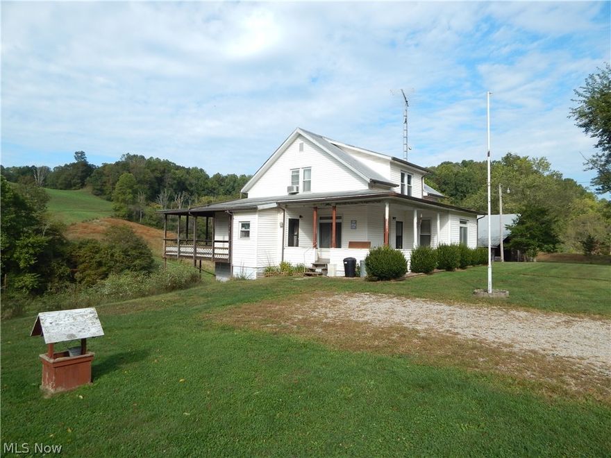 AFFORDABLE FARM LIVING!  
This home has character and sits on 14.7+/- Acres!  If you want a mini-farm, this charming 4 bedroom, 2 bath home offers Free Gas (APO), has hayfields, pasture, a hay shed and is partially fenced for some livestock! The home has had beautiful hardwoods that were hidden through the years but, are uncovered and ready to be made beautiful again!  The back porch is a great place to enjoy mornings watching over your animals and taking in the view.  In the unfinished basement, you can come in from farming and shower then drop your clothes into the washer before heading upstairs. With the Free Gas, water well and sewer, the utilities are certainly affordable.  Quaint, country living is right here!  Call for details!