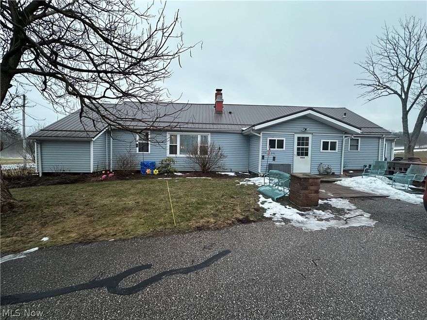 Located in Huntsburg, this property features 4 bedrooms and 2 bathrooms across approximately 2,373 square feet. The interior has undergone updates, showcasing a refreshed aesthetic and functional layout. Key structural elements provide peace of mind, including a roof installed five years ago and an HVAC system from 2011. The layout includes spacious living areas and a water treatment system. Outside, the property offers a deck and an attached garage on a half-acre lot. This residence balances established systems with significant interior potential.