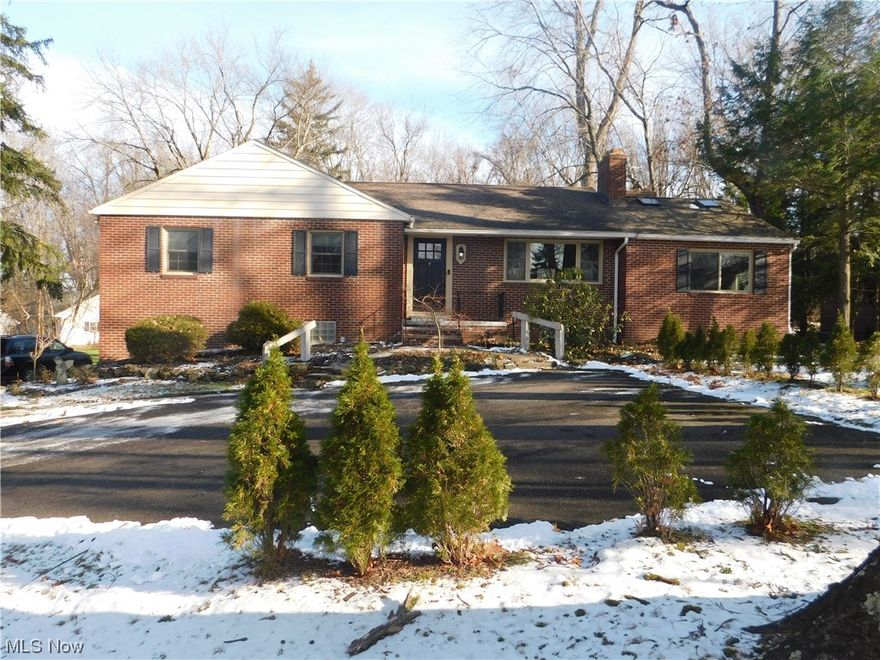 LAKE PRIVILEGES! Adorable 3 bedroom 2 bath Brick/Aluminum Ranch home situated on over 1/2 acres. Is within walking distance to Crystal Lake and exclusive access to Silver Lake swimming, boating and fishing! Hardwood floors and bright and airy sunlight flood this mid century modern home. There are 3 fireplaces in the spacious living areas to enhance your seasonal lifestyle. Lower and first floor laundry hookups are available for easy accessibility. Many recent improvements, garage door '20, family room carpet '22, painted bath and utility '23, downspout drainage '19, electric panel '16, chimney tuck pointed '23 and roof moss remediation '23.