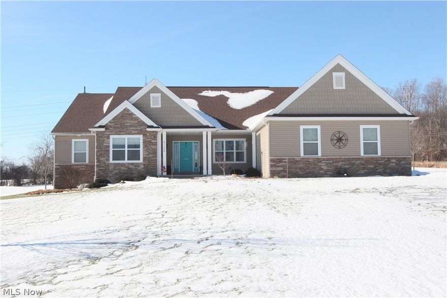 6726 Legacy Lane, Wadsworth on 2.3 acres is awaiting you! This luxurious 3 bedroom 2.5 bath single story ranch home is located at the cusp of Medina and Summit Counties, near Sharon Twp & Copley. One owner and newer built with a custom design and open floor plan and split bedroom layout and lots of forethought. Greeted at the front porch the foyer opens to the large family room with fireplace, 9 ft. ceilings with views out the back acreage and stylishly designed outbuilding. A front den with double glass doors and formal dining room garner each side of the open large foyer. The long island separates the gourmet kitchen and with granite, trendy back splash and stainless steel appliances. A breakfast room with lots of windows is connected to the kitchen and leads to the back private patio. Master bedroom with master bath, his & her closets, double vanity, garden tub and walk in shower. 2 accommodating guest bedrooms one with an in suite private full bath and large walk in closet. Large l