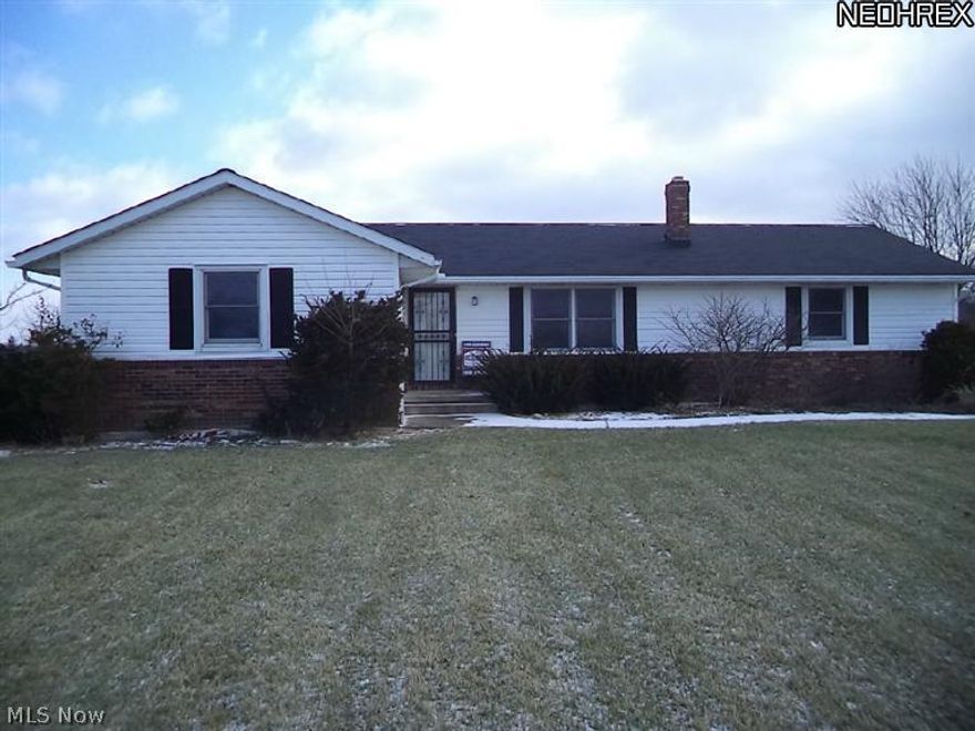 fixer upper, master bedroom has bath and fireplace, 1.38 acres with garage type shed , concrete deck for low maintenance