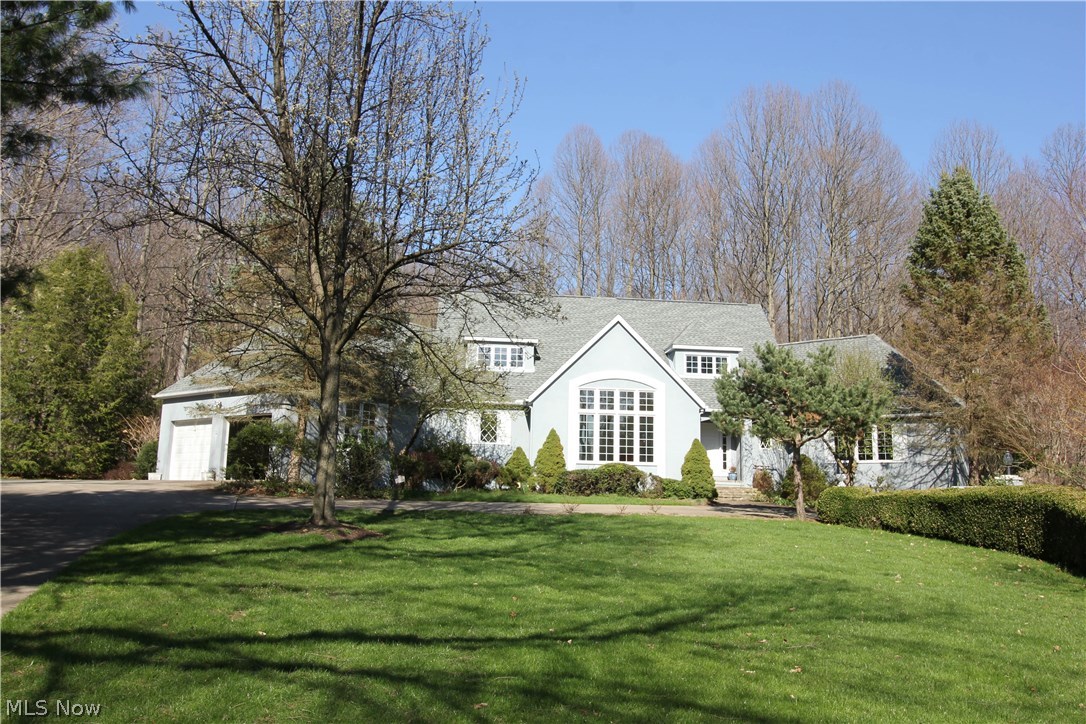 Five bedroom 3500 sq.ft. estate in Bath Twp is yours for the looking. The large lot with winding concrete drive leads you to this property on Medina Line Rd. A loft overlooks the 2-story foyer and a stunning formal living room presents at the front door. Private breathtaking views from every window with beautiful patio and in-ground pool. The appointments throughout this home are striking and tasteful. First floor master and elegant formal dining room round out this home. The basement rec room is spacious and perfect for entertaining. The grounds include a meandering creek, plenty of woods, garden, fruit trees, grape arbor. In-ground pool is heated (w/newer heater), hot tub and slate patio.