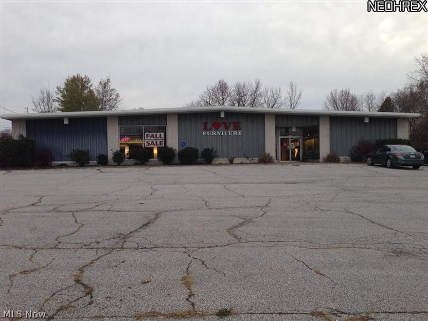 Quality constructed furniture store with excellent signage and visibility. Spacious 17,952 sq ft free-standing retail/flex building. 2 acre lot with ample parking in the heart of Tallmadge. Loading dock and overhead door. in back, private office upstairs. About 7,000 s.f. of warehouse at the rear connected to the showroom and offices.    Great use for Owner Operator, Retail, Church or Warehouse