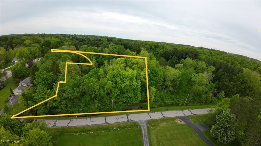 Build your dream home on 2.69 serene acres in beautiful Chardon! This rare opportunity offers a combined 2.69 acres nestled in a peaceful residential area just minutes from charming downtown Chardon. Located on a quiet stretch of Clarkwood Dr, with additional frontage on Ravenna Rd, this property provide a picturesque setting with privacy, mature trees, and a gentle uphill grade ideal for a custom home with character. Gas and electric are available at the street. While currently comprised of two parcels (1.52 and 1.17 acres), the property is being sold together to provide ample space and flexibility. Build your home on one expansive lot or explore options for future use with township approval. Don't miss this chance to own a sizable, buildable piece of land in a sought-after location! Seller is Motivated!