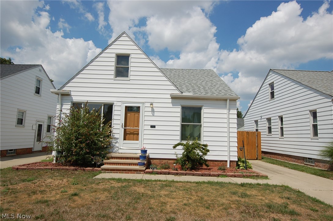 Well maintained home in the heart of Parma! Welcome home to 8320 Wainstead Drive located in the Parma circle area. This charming Bungalow features many updates and is move-in ready! Although this home currently only features 2 finished bedrooms, like most bungalows the walk-up attic space is perfect for finishing into a spacious owners bedroom. This one is ready for you to finish to your own desired design! Making this home a spacious 3 bedroom home! Don't miss out on this home! Updates include: Newer roof (2010), Newer Anderson Windows (2015), Newer 100amp electrical panel (2010), Newer hot water heater (2015), Newer central air conditioning (2010), newer bathroom insert (2011), and newer wood privacy fence and gate (2012). This home also features an oversized living room, formal dining room, large bedrooms, huge finished basement, and workshop area in the basement. The yard is fully fenced in featuring a paver patio and huge 2.5 car garage! This home is also close to freeway access a