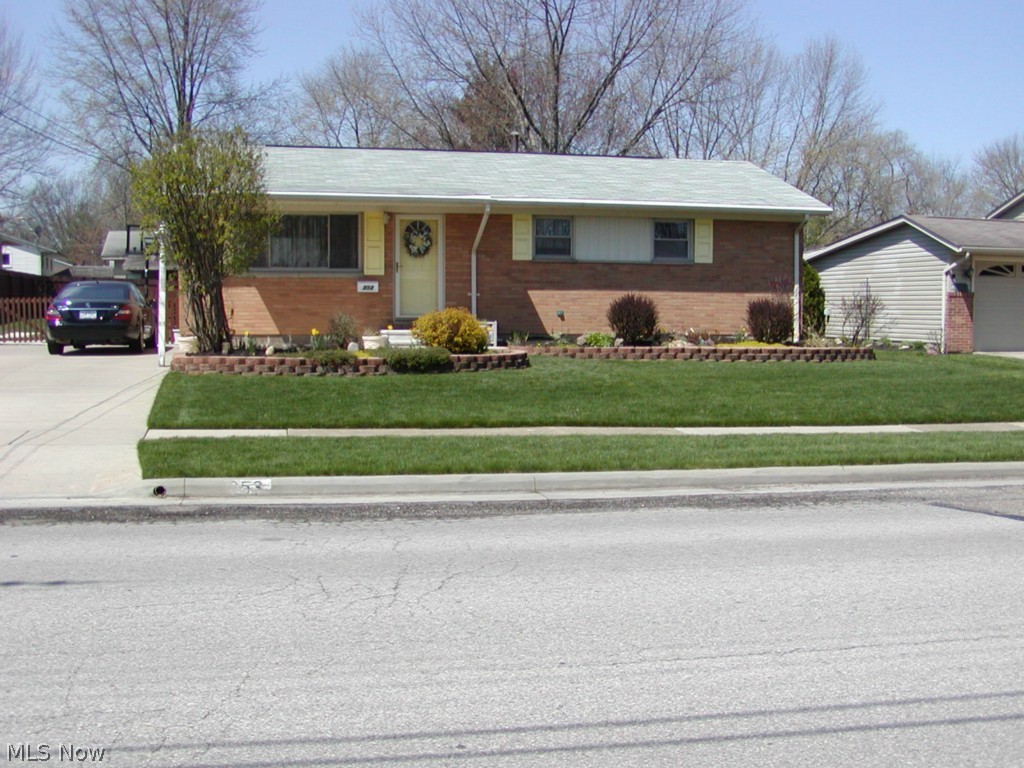 Lot: 75 X 141.Move-in-able, well maintained 3 bedroom 2 bath brick ranch on beautifully landscaped lawn. Many updates, replacement windows, glass block windows in the basement, quality, newer applianced kitchen, great wood floors, double wide driveway 6" thick with plenty of parking area. Electronic air filter & humidifier on newer Trane furnace (2007). Heated Florida room with extra gas hook-up. It leads to patio and wooden fenced yard plus storage shed. Granite counter in the immaculate main bathroom. Roof- 2009. America's Preferred Home Warranty included. Special assessment of $61. per year is for continuous sewer maintenance. For an allowance see Broker remarks.