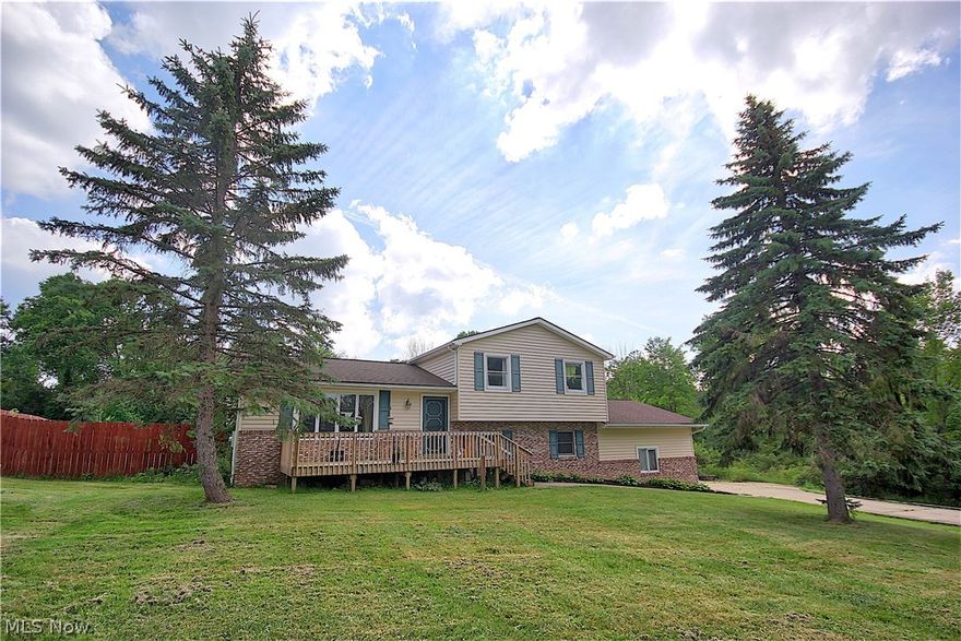 Very large split level offers an open floor plan perfect for entertaining. This home features two large family rooms, lower one features laminate floors. Kitchen and dining room offers tile floors and an open concept. There are 3 bedrooms upstairs with an additional bedroom , office , playroom, or workout room in the finished basement area. Off the back of the house you will find a large heated sunroom which leads to a wood deck in the backyard with an above ground 33' 52" deep pool. Privacy fence around the back yard. Roof & siding were replaced 2004. All new plumbing throughout the house 2004. Septic was replaced in 2002 - City water 2002. Selling "As Is" seller not to make any repairs.