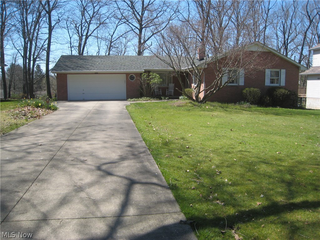 This is a one owner brick ranch on a beautiful lot. This house sits is one street away from the Tallmadge border. It has a full basement with potential to finish. There is also a 2 car attached garage. Enjoy the front porch and also the patio in back. This home needs some updating and is ready for your personal touches. There is no central air.