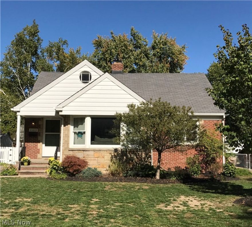 Step inside and be ready to be wowed. Fantastic flow with hardwood floors, fresh paint and bright and cheerful decor. Newer windows allow light to showcase this darling house. Dream kitchen with maple cabinets, porcelain tile floor, stainless appliances and granite counters. Generous sized bedrooms including master suite with full bath, plenty of closet space and nooks and crannies perfect for a sitting area and office. Gorgeous rear yard with mature landscaping and stone patio, gorgeous pergola and full wood fence. Awesome finished basement with gas fireplace, and wide open space that is accented by a stylish barn door. This home, just steps from Bain Park has tons to offer and to get excited about, come see it today!