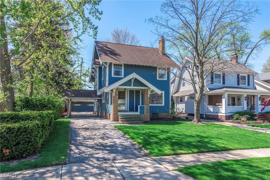 Beachcliff ONE colonial with second parcel behind the home! Charming architectural details...roof over the driveway at side entrance, decorative wood dormer structures and cute front porch with storage closet. Beautiful, newer exterior paint. Double-doored entry with original tile floor and coat closet. Spacious living room with wood-burning fireplace (not operable) with gas line and built-in bookcases! Open to large dining room with fun, glass pendant overhead lighting. Lovely, original leaded-glass windows in both living and dining rooms! A bonus room with French doors enlarges the first floor living space. Mostly hardwood flooring throughout! (carpet on stairs and most of second floor with hardwood beneath.) Original kitchen with painted maple cabinetry and all appliances will remain! Off the kitchen there is an unexpected mudroom/butler's pantry. Full bath off hall with stall shower and single vanity! Door to two-level deck and beautiful rear yard. Higher ceilings in most areas! Wood staircase with landing leads to upstairs hall with stained wood, original linen closet. Second floor has three large bedrooms with good-sized closets! Second full bath with original tile floor, pedestal sink and built-in storage closet. Great finished porch runs the length of the back of the house! Third floor is finished for a cool fourth bedroom or rec room or office with angled ceilings, walk-in closet and under eave storage! Newer HVAC (installed '22.) Full, mostly, unfinished basement with laundry area. LG front load washer and dryer stay with the property! Electrical updated 2005. Pretty rear yard with large, two-car garage! Excellent location with access to private beach and within walking distance to local shopping, restaurants, grocery stores and Rocky River Park! With some TLC this home has the space to be whatever you would like it to be...