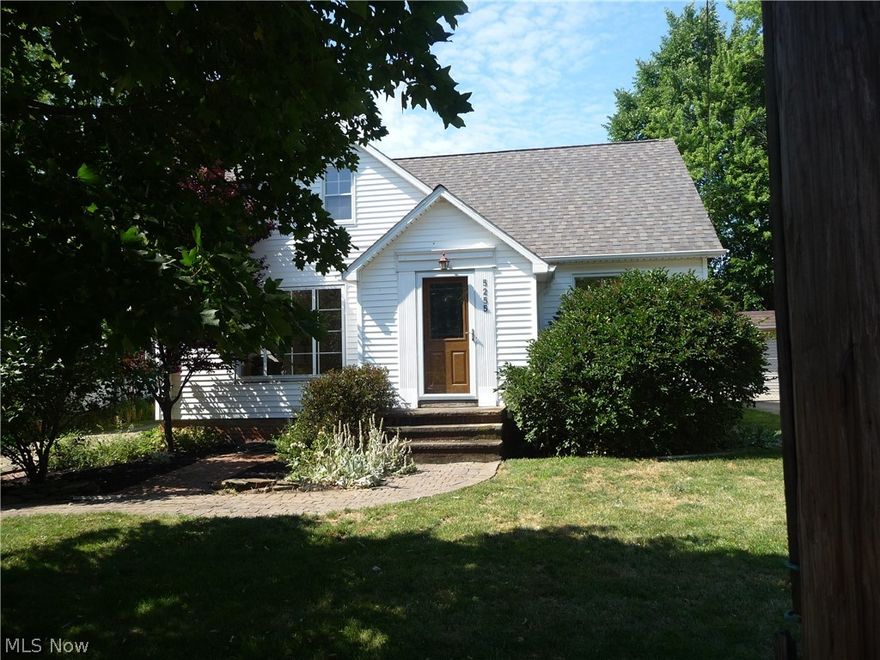 Welcome to this recently painted move-in ready home which offers oak tongue & groove floors on the first floor and fabulous pine wood floors & beautiful built in cabinets & shelving on the second floor. A cozy wood burning fireplace in living room with vintage and reproduction lighting throughout the home stays. Huge windows throughout provide lots of light and cool breezes on both floors, yet this house also provides easy one floor living if you so choose. Whole house air conditioning will keep you cool in summer and April Air will keep you comfortable on those cold winter nights. Best of all is the surprise off the kitchen dining area: a huge custom built, extra deep porch that extends almost across the entire back of the house. It overlooks a private, fenced in backyard with perennial beds and brick patio. There are custom made canvas and clear plastic covers for the porch that protect both it and your possessions during the winter. Very usable basement. The entire property had exte