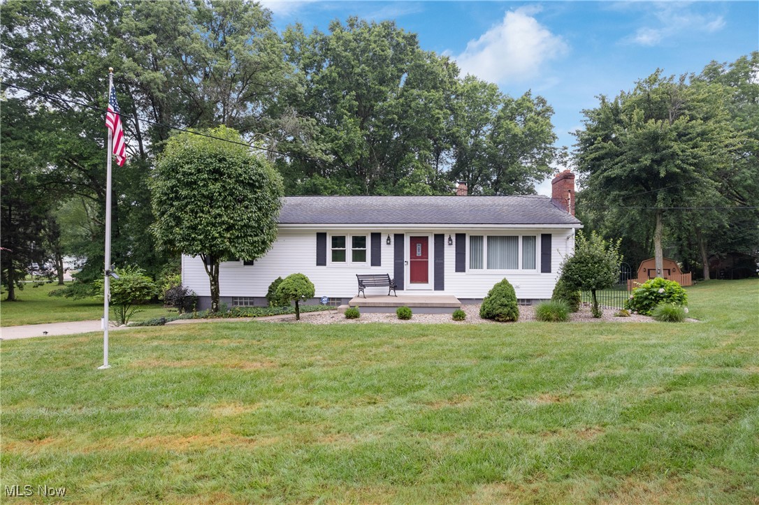 Check out this gorgeous raised ranch situated on over an acre in desirable Green LSD! This recently renovated home has neutral colors, plenty of natural light, and new flooring throughout the main level and features a large living room w/fireplace, eat-in kitchen, 2 full bathrooms, and 3 bedrooms. One of the bathrooms is connected to the master bedroom and walks through to the kitchen. The partially finished lower level has what is currently a workshop but can easily be finished into another entertainment space w/fireplace, laundry room, and additional space for storage. Outside you'll find a deck that overlooks the beautifully landscaped private yard that has 2 sheds, one of which is very large and has electricity ran to it. Schedule your private showing today!