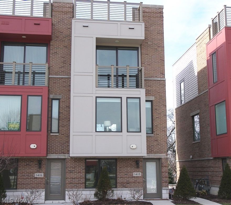 Stunning townhome built in 2014 in the Bluestone Community with great access to Case University, the hospitals and shopping.  Designed in today’s style and colors with engineered wood flooring, this townhome has it all. The main level features a room perfect for a large entry way or an office/study and access to the one car attached garage with extra storage.  Easy living is offered on the second level with an open concept featuring a great room, dining area and an upgraded kitchen with espresso cabinets, stainless appliances, granite countertops with an eating bar and sliding doors to a balcony with great views.  There is also a half bath on this floor as well.  The two bedrooms and two full baths, with the master suite having its own bath, walk in closet and balcony, are on the next level.  Best of all – don’t miss the rooftop 23x16 deck which is perfect for entertaining.  Tax abatement is through October, 2021.