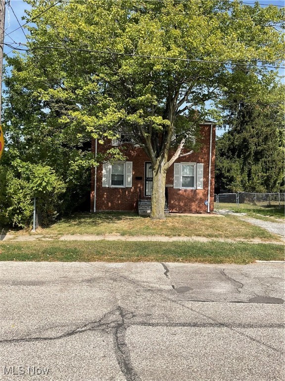 Welcome to your new home at 19409 Cherokee Avenue. This timeless 2 bedroom, 1 bath brick colonial home with central air is a perfect starter home or investment property to add to your portfolio. It is located in very close proximity to the City of Euclid. The first floor offers a living room, a dining room with built shelving and a kitchen. Upstairs you will find 2 ample sized bedrooms and a full bath. The basement has an additional storage area and glass block windows. The ample sized fenced in backyard is equipped with a storage shed. Great opportunities await this single family home. Schedule your showing today.