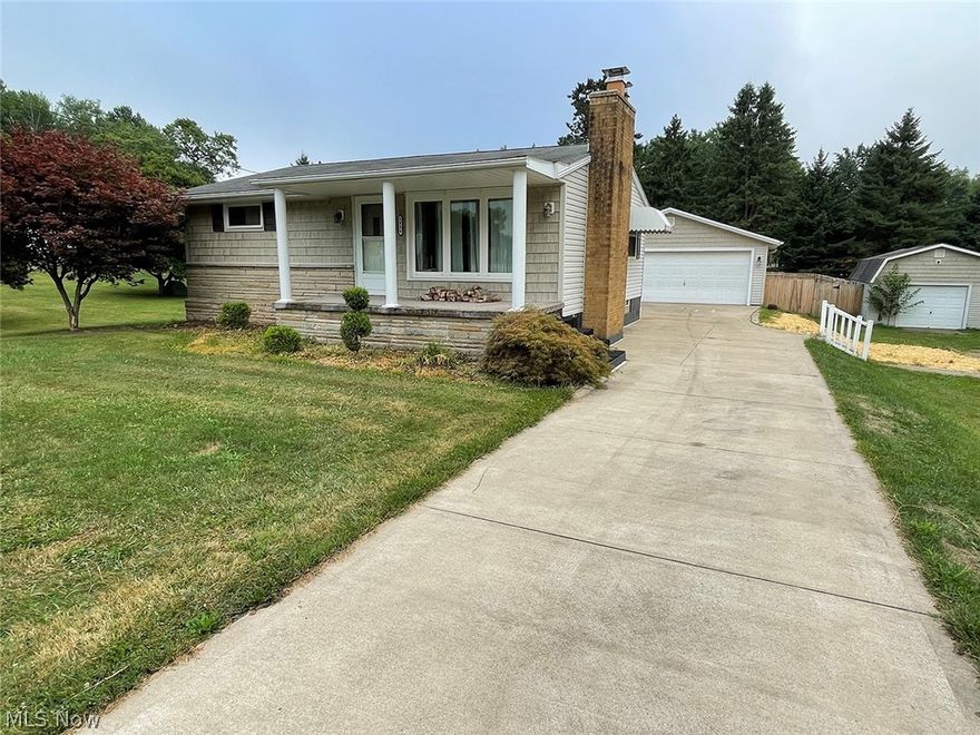 Three real estate parcels selling as an entirety. Vinyl-sided ranch home with two bedrooms, oversize detached garage, and fenced rear yard. Nice concrete drive. The second tax parcel has a nice 3,844 SF block building/former body shop with overhead front and rear doors, and an office area. The third parcel is a vacant lot in the back.