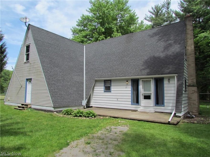 Short Sale  Subject to lender approval A-frame house on 2 acres, complete w/fruit & nut trees & a real gardener's delight. Patio, 12x18 deck, storage shed, garage.$120 Annual fee  FOR ROAD MAINTENANCE. Buyer would be responsible :Underground cable was blown and would probably need to be replaced.  They would need to open the ground before they could tell the extent of the problem and the fix.  So, right now there is a temporary patch to keep the refrigerator and some outlets for lamps running.  Other than that, there is no power in the house, which also means no running water or bathroom.  mold issues in attic. detected.