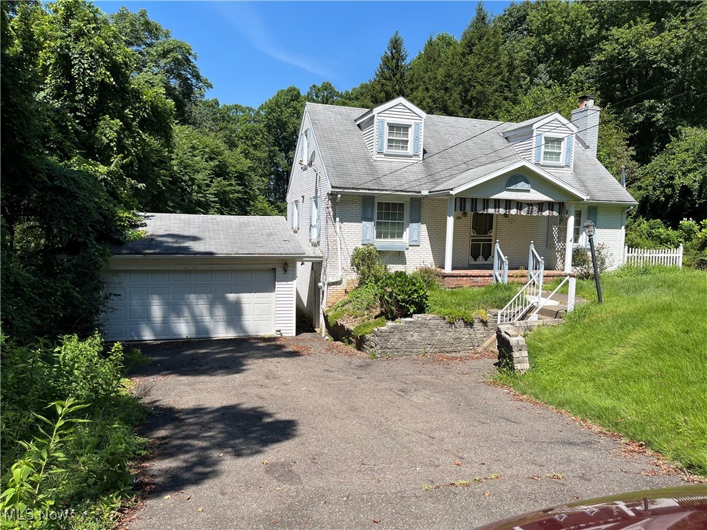 Very quiet neighborhood (dead end street). Brick 3 bedroom, 1 1/2 story home. Full walk out basement. Detached 2 car garage.
Needs flooring, walls & ceiling recovered. Minimal cost to make these updates.
