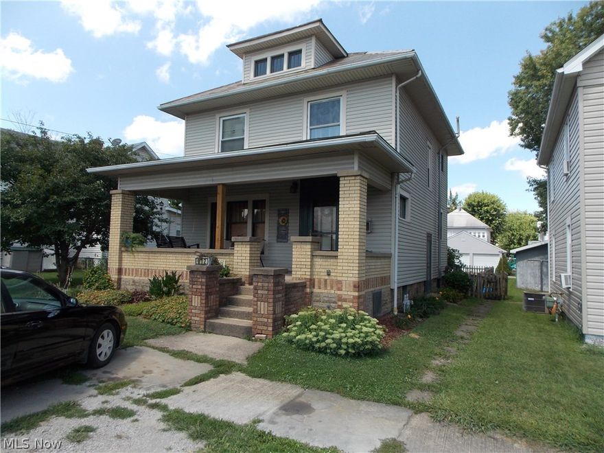 Majestic Home, Lead glass french doors and beautiful oak trim. Newer carpet, hot water tank replaced 2016. Large upstairs hallway with built in storage. Tastefully landscaped with a fenced back yard. Detached 2 car garage quite neighborhood on a dead end street. Home warranty provided by seller with Old Republic Home Protection. This home has a large front porch across the front. This could be the home of your dreams call today for a personal tour and have a seat on the charming window seat in the huge Dining Room.