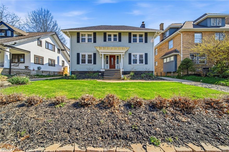 Stunning Coventry Village Center Hall—fully renovated top to bottom in 2022! Bright, sun-filled interiors throughout. The spacious living room features a tiled fireplace with a custom mantle and opens to a newly screened covered porch, perfect for warm evenings. The open dining room with distinctive moldings connects to a new kitchen with granite counters, white cabinetry, an island, and stainless-steel appliances. Upstairs, the primary suite includes a private bath with double sinks and a tiled shower. Two more bedrooms—one with porch access—and a renovated full bath complete the second floor. The third floor offers a skylit suite with a private bath, ideal for guests or a second primary. Major updates done in 2021/2022: new windows, roof, gutters, furnace, central air, plumbing, electrical, and waterproofed basement. New Hot water tank (26) 2-car garage added drywall (22). The driveway was expanded (23). Fenced-in play area (23). Just move in and unpack!