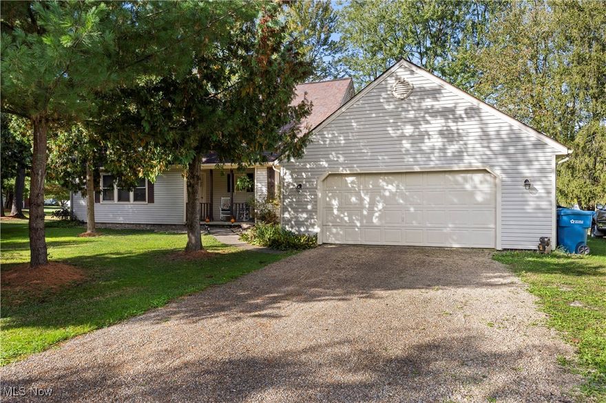 Welcome to this timeless cottage-charm cape cod, featuring a 2nd level with loft area leading to a private bedroom, full bath, sitting room, office/den area or add your own personal vision for this versatile bonus space, with a view overlooking the cozy & warm living room which features a beautiful, timeless staircase.  This is a very efficient type of house where you will adore the covered front porch for relaxing during the fall evenings and all seasons year round plus a wonderful deck out back with a beautiful view.
Just step inside the beautiful kitchen to see the lovely, open and spacious room. There is plenty of space to move around the island surrounded by tons of charming oak cabinetry, w/ appliances making it the perfect place for you to entertain and welcome your guests. If you love to cook, this kitchen is a must with plenty of room. Many updates include: new furnace 12/24, water heater is 4 yr old, garbage disposal 2 months, range 6 months, refrigerator is 5 yr, main floor bathroom is newly remodeled 2 months ago, upstairs there is newer flooring, water closet, luxury vinyl flooring & many updates throughout. this style of cape cod is so warm & comfortable, it just says, "Choose me, I'm a one-of-a-kind find!" Make it your own today. Close to Finley State Park, Metro Parks & Wellington Reservoir. **Seller to provide to Buyer a transferrable 1 year home warranty.**