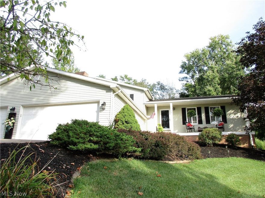 This fabulous custom built, one owner home has been meticulously maintained from top to bottom.  Beautiful hardwood floors in the foyer, spacious living room, and dining.   Kitchen features ample cabinets, Corian countertops, and a breakfast bar.  The dining area open to a beautiful 3 season room for relaxing with access to the patio and backyard.   The upper level offers a huge master suite with walk-in closet and an attractive master bath with jetted tub; two spacious bedrooms and a full bath.  The lower level features a huge family room with lovely stone fireplace, an office/den that can be used as a fourth bedroom, convenient laundry/utility room and a full bath.   A few steps down is the basement for ample storage or potential additional living space. 
This quality built home offers 2 x 6 wall construction, 10" reinforced block walls. extra insulation, new composite floor on front porch. new ceiling in 3-car garage.  Freshly painted and tastefully decorated, this home is ready fo