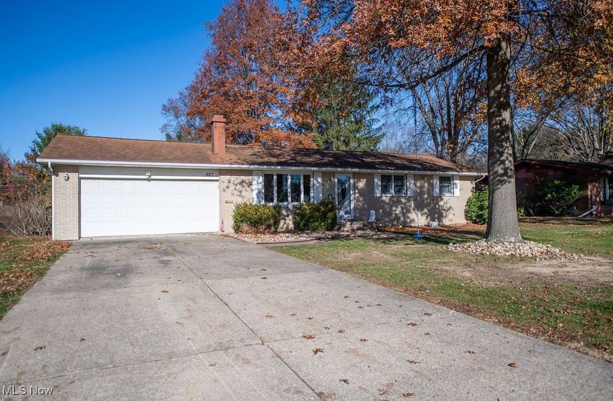 Welcome to this Brick Ranch in an ideal location! Nestled on a generous, flat lot just under 1/2 acre, this spacious brick ranch offers immediate access to everything, including being steps away from Dover East Elementary. The main floor boasts three bedrooms, a full bath, and a custom oak kitchen.  The huge family room addition in the rear of the home flows into a 15x20 covered, screened porch, perfect for indoor-outdoor living and entertaining. Discover additional living space in the partially finished basement, featuring a second full bath, a potential fourth bedroom, and a cozy wood-burning fireplace.  Enjoy peace of mind with most major updates already completed, including two furnaces, a newer hot water tank, water softener, and a whole-house fan. Features some natural hardwood floors, a convenient two-car attached garage, and all kitchen appliances are included.