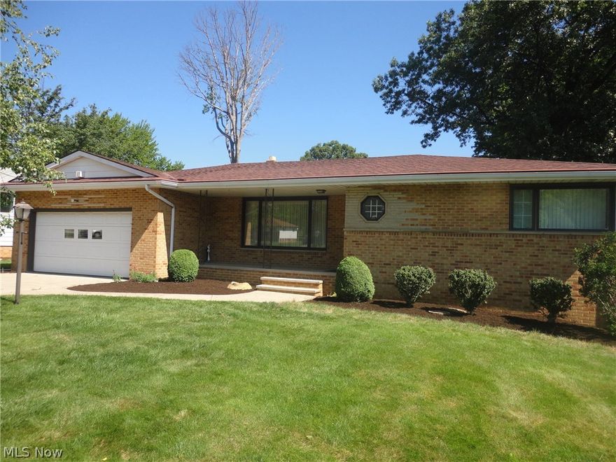 Solid spacious Brick & Aluminum Sided Ranch !  Large lot * Shed * Updated Eat in Kitchen with newer disposal, countertops and sink * All appliances remain * Main Bath nicely updated including flooring * Updated Pella windows * Ceiling fans * Spacious Living Room with a decorative fireplace * Newer driveway, patio and sidewalk concrete * Gutter guards * Newer front door * Newer HWT * Newer Lenox furnace * Newer Roof * Security system * 1/2 Bath recently updated with new sink, vanity top and flooring * Newer front door and storm door * Finished Recreation Room with glass block windows * Nature stone garage floor * Newer garage door and opener * Attic fan * Updated landscaping * Very clean and well kept home !