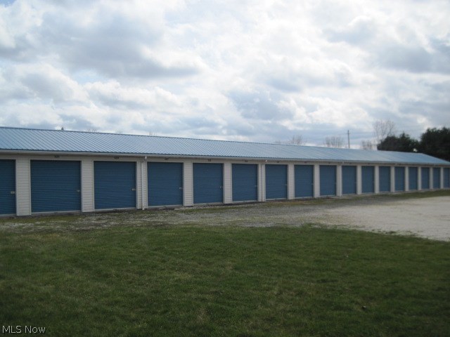 Fantastic Income properties, with so much potential! First building is 34 storage units. Each storage unit is 10x12. There is a new metal roof on this building. At this time the storage units are 85% rented @ $50 a month. Building 2 (main building), this building is 2 stories with 3 phase electric. On the first floor there is a reception/front desk office and showroom/lounge area. There is also a warehouse with 2 bathrooms. On the second floor there is a large office area with large cubicles and more bathrooms. Also there is storage with 3- 16' over head doors and concrete floors that can be used to store RV, boat, ect. storage. Also 2 more storage units in this building with over head doors for car storage, and more. Building 3, offers 3 phase electric, and 2 resonant heaters with tons of storage. There is a studio apartment. Tons of income potential ! Must see to get a good feel of everything this property has to offer. There is a passing commercial septic tank with a current operati