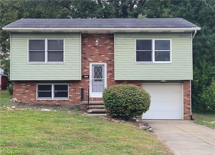 2 bedroom, 1 bath, raised-ranch/bi-level with bonus rooms, including 3-season/sunroom and finished family room in lower level.  Deep 1-car attached garage for extra convenience.  Other amenities include kitchen appliances, central air, large closets, and several updates - including freshly painted walls, new vinyl flooring in kitchen and bath, two new sliding patio doors, new toilet, appliances only a couple years old, and AC only a year old.  Just needs some finishing, personal touches.  Conveniently located close to schools and downtown.  This one won't last - schedule your showing today!