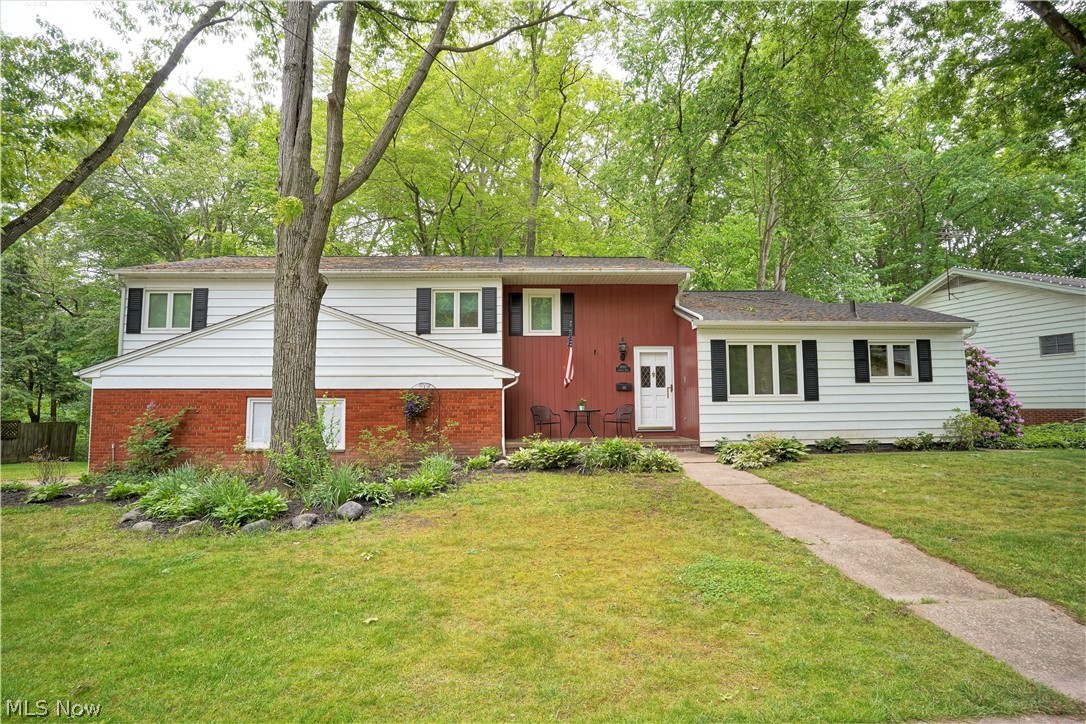 Wow! Welcome to this stunning, picturesque 4 bedroom, 2.5 bath split level home. Come on in from the front porch through the foyer to the living room, dining room & kitchen all with original oak plank floors throughout. Living room offers a built in speaker, large picture window with peaceful views of the wooded backyard. The bright, gorgeous updated kitchen (2019) has abundance of Amish custom cabinetry with soft close hinges & drawer pulls, carbonized bamboo floor, quartz countertops, reverse osmosis unit, stainless steel appliances-gas stovetop, built in double oven-convection/microwave & convection, French door refrigerator, dishwasher, built-in speakers & room for a table. Upstairs you will find three bedrooms, the main bathroom has been updated (2020) with Amish custom cabinetry, Kohler pedestal sink & walk-in shower, laundry chute. Master suite bathroom is updated (2020) with Amish custom cabinetry, walk in closet/wall to wall reach in closet & Pottery Barn Jack & Jill vanity. T