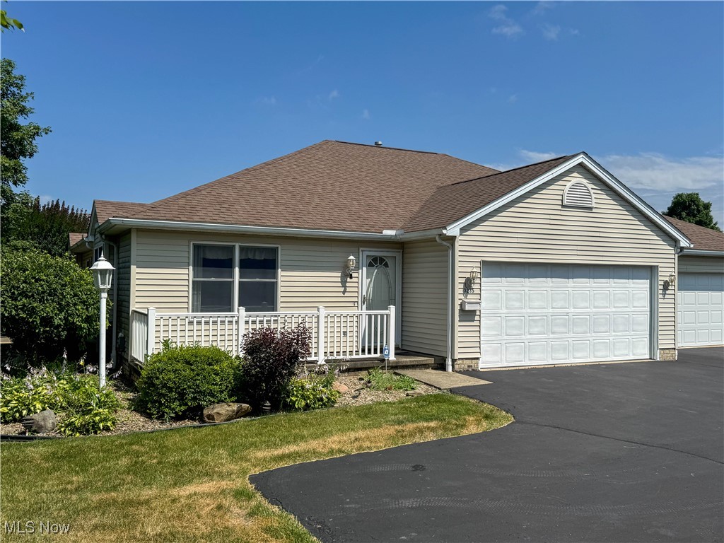 A must-see!!! Beautiful ranch condo located in "Condos at the Top" in Canfield! This one has it all! Two bedrooms both with full baths and newly remodeled shower stalls and glass doors. Huge kitchen with gorgeous cabinetry, custom-built island with premium granite, custom-built Pantry, and built-in Kitchen Table. First-floor laundry room, central air conditioning, Large 18x18 Living room with custom oak built-in entertainment center. New hot water tank 2024, 2-car attached garage, Beautiful Landscaping, trees and bushes. large side yard access, a beautiful place to be outside! Schedule your private tour today!
