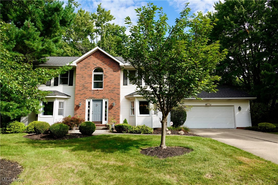 Meticulously maintained and thoughtfully updated throughout the years, this traditional colonial is situated within a highly sought-after friendly Solon neighborhood offering the perfect blend of style and space. Enter through the 2-story foyer which is flanked by the formal living and dining rooms. The stylish contemporary remodeled eat-in-kitchen is located at the heart of this home offering a huge island with prep sink, newer appliances and a convenient bar area for entertaining. Adjacent is the cozy vaulted family which is the perfect place to settle down to watch your favorite shows in front of the beautiful wood burning fireplace. The first-floor laundry room and convenient 1/2 bathroom round out the first floor. The second floor offers the vaulted master suite with a generous walk-in closet and a glamorous bathroom with jacuzzi tub and separate shower. Three spacious bedrooms and the second full bathroom complete the second floor. The full basement is finished with an office area, adorable playroom, and multi-purpose rec room. The basement also offers an unfinished work-shop as well as tons of additional storage space. Outside, enjoy the private rear yard with its custom paver patio and storage shed. The HVAC and TANKLESS HOT WATER HEATER have been replaced within the previous 3 years for peace and mind. Finally, the extra deep attached two-car garage offers an EV charger. Located near the highly rated Solon schools, parks, recreation center, and newly paved multi-purpose trails~this home is ready for its new owner. Sellers would like a transfer date in Mid December.